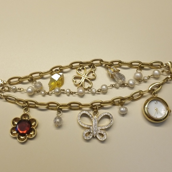 Gold charm bracelet with watch. - Picture 2 of 6